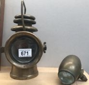 An early 20s brass Howes and Burley ltd Birmingham veteran car side light and 1 other.