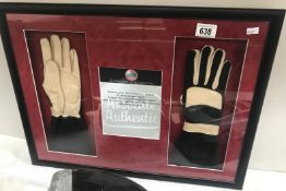 A pair of authentic framed and glazed Olivier Panis gloves.