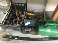 A box of drill bits. tray of tools including block, caravan stabiliser and petrol can.