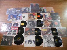 Approximately 60 pop and rock vinyl LP records (mostly 60s).