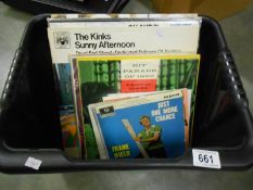 A box of LP's including The Kinks, Johns Lennon etc.