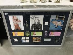 Madonna framed and glazed photo collage, including tour tickets etcwith certificates.