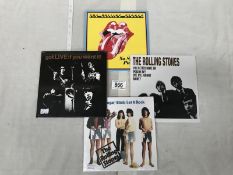 Rolling Stones EP and 3 7" singles all sealed and mint condition.