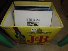 A box of LP's including Michael Jackson, Foreigner, Drifters & Diana Ross etc.