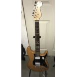 A good quality 'Stratocaster' style electric guitar, neck good, action fine,