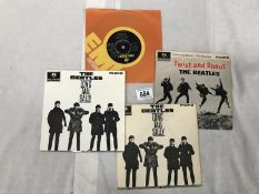 3 Mono Beatles Eps picture covers and 1 other EP.