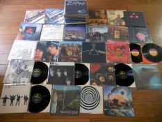 Approximately 60 progressive rock and rock vinyl LP records.