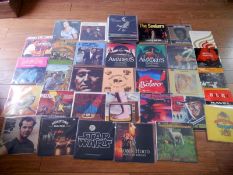 Aprroximately 60 famous vinyl LP records.