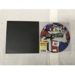 Sex Pistols 'Anarchy in the UK' picture disc and a 45rpm the same, both mint condition.