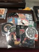 12 mint picture discs, The Darkness, The Vines etc.