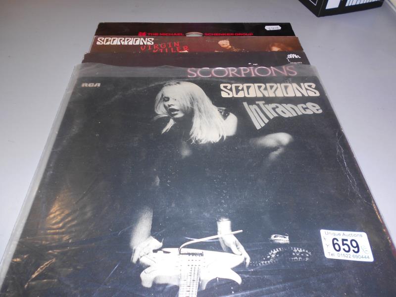 3 albums including Scorpions "In Trance" and Micheal Schenker