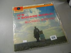 A rare Michael Bentine 'it's a square world' gold/black label