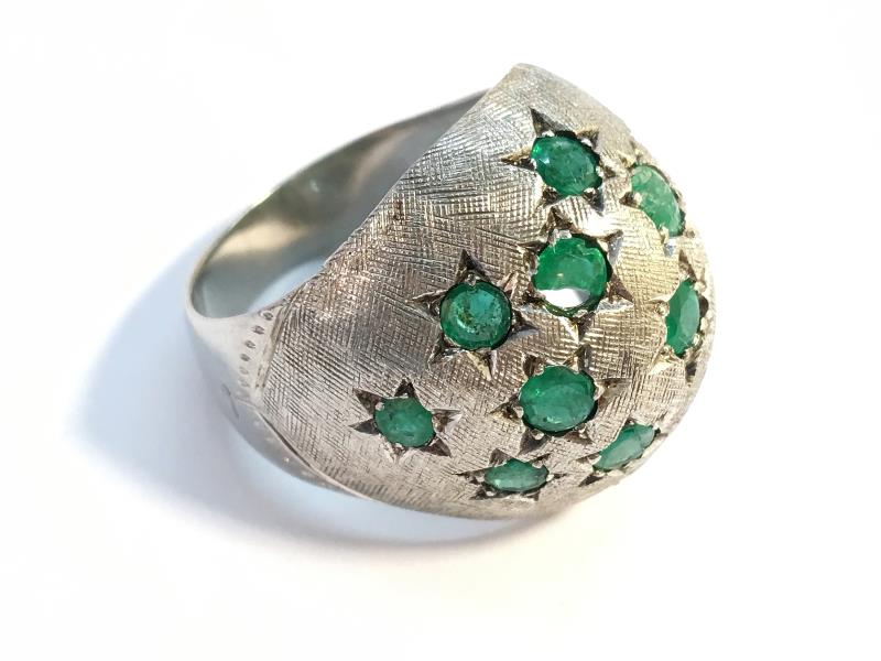 A 1970s emerald bombe ring in 18ct white gold. Set with 15 emeralds in star settings, ETCW 1.12 ct. - Image 3 of 8