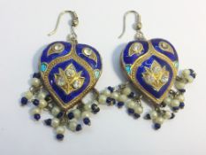 A pair of reversible basse taille enamel pendant earrings, fashioned as hearts.