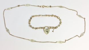 A Fancy link neckchain in 9ct, plus a fancy link bracelet in 9ct with gold heart lock clasp.