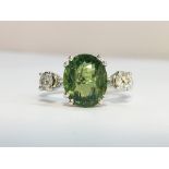 A Contemporary Demantoid Garnet and Diamond Ring in 18ct white gold.