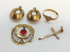 A small quantity of 9ct jewellery, including a cross pendant,