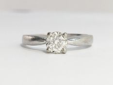 A Diamond solitaire ring, set in 18ct white gold, diamond weight 0.33 ct, stamped in shank.