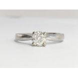 A Diamond solitaire ring, set in 18ct white gold, diamond weight 0.33 ct, stamped in shank.