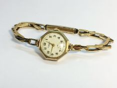 A solid 9ct Gold Cased ladies Rotary Wrist Watch, total weight 15.44 grams.
