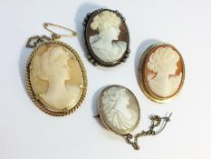 Four Carved Shell Cameo brooches, 2 set in 9ct yellow gold, one in 9ct rolled gold, one in silver.