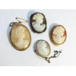 Four Carved Shell Cameo brooches, 2 set in 9ct yellow gold, one in 9ct rolled gold, one in silver.