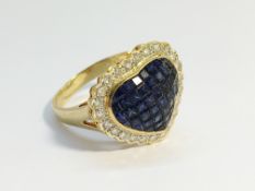 A Sapphire and Diamond Heart Shaped Cluster Ring set in 18ct yellow gold.