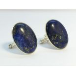 A pair of oval Lapis Lazuli Cufflinks, measuring approximately 28mm long.