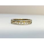 A modern Diamond Ring set in 9ct white and yellow gold, depicting hearts and crosses. ETCW 0.