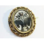 A large Victorian Swivel Brooch, approximately 6cm high, finely wrought,