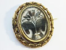 A large Victorian Swivel Brooch, approximately 6cm high, finely wrought,