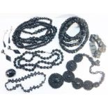 A nine piece lot of French Jet and Whitby Jet Jewellery, including necklaces, a brooch,