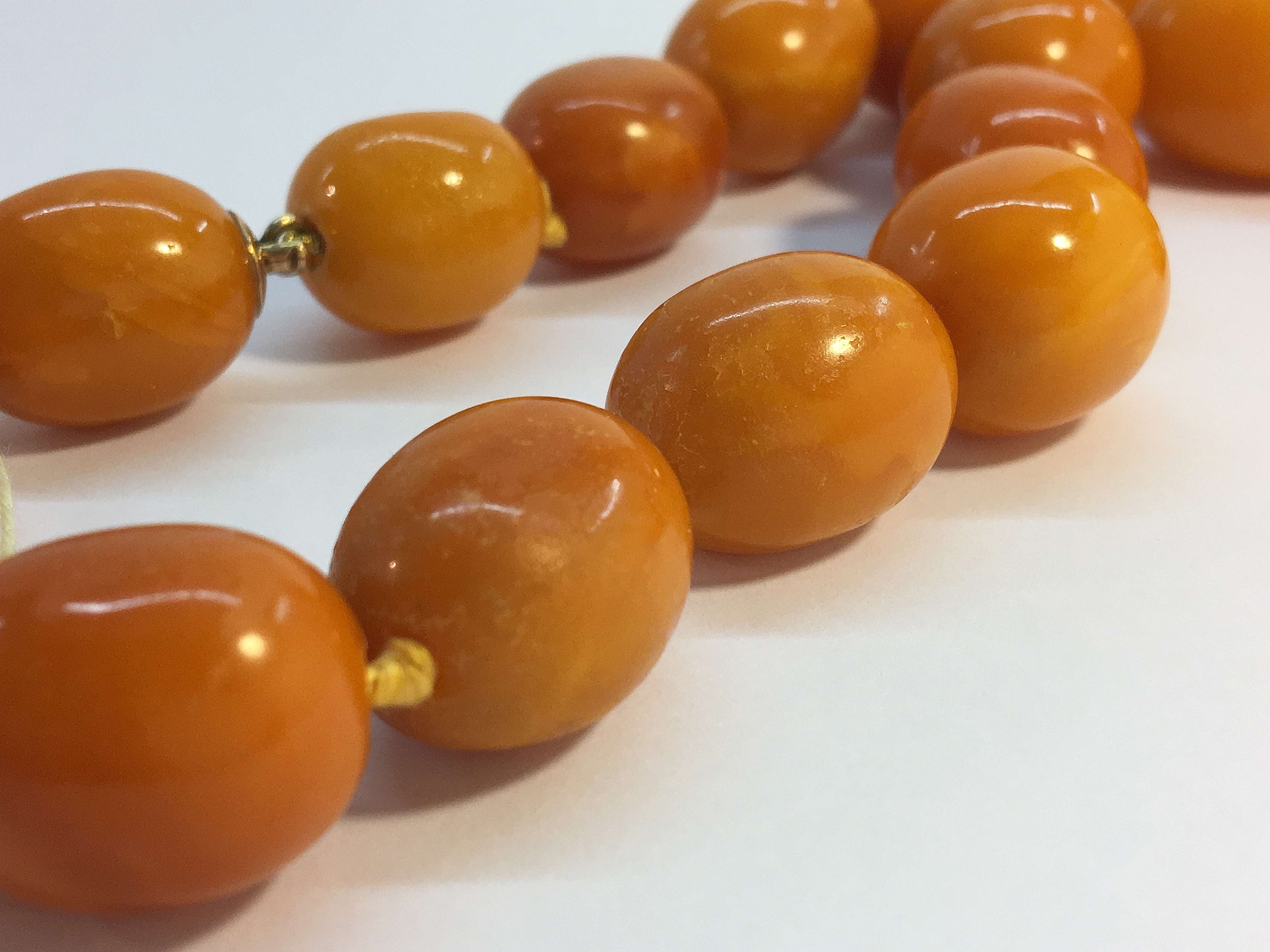 A string of butterscotch amber beads, approximately 18" in length. - Image 4 of 6