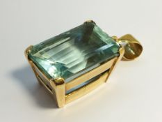 A large rectangular step cut natural Aquamarine pendant.