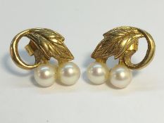 A pair of Cultured Pearl earrings set in 9ct gold fashioned as grape vines, total weight 1.95 grams.