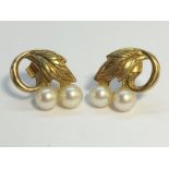 A pair of Cultured Pearl earrings set in 9ct gold fashioned as grape vines, total weight 1.95 grams.
