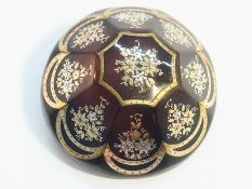 A Victorian tortoiseshell pique work brooch, inlaid with gold and silver.