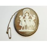 A 19th century carved shell cameo depicting the Three Graces, set in 9ct bezel with ropetwist frame.