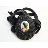 A carved Victorian Whitby Jet Pear shaped Pendant measuring approximately 5cm high,