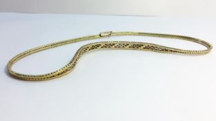 A Tri-colour gold woven 9ct necklace, with box clasp and safety clasp. Total weight 20.5 grams.