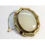 A large Victorian swivel brooch, approximately 6cm high,