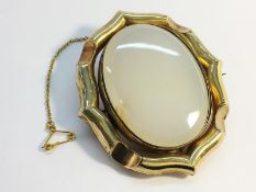 A large Victorian swivel brooch, approximately 6cm high,