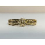 A Diamond Cluster ring set in 9ct yellow gold, ETCE 0.13 ct. Ring size M, total weight 1.89 grams.