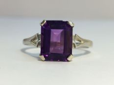An Amethyst ring set in 9ct white gold. The ECW of the emerald cut Amethyst is 2 carats.