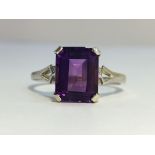 An Amethyst ring set in 9ct white gold. The ECW of the emerald cut Amethyst is 2 carats.