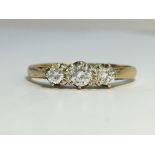 A three stone Diamond ring in 9ct yellow gold. . The ECW of the diamond is 0.