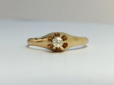 A Diamond single stone ring in 14ct yellow gold.. The ECW of the old cut diamond is 0.