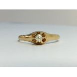 A Diamond single stone ring in 14ct yellow gold.. The ECW of the old cut diamond is 0.