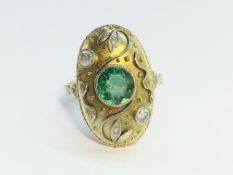 A 1940s Tourmaline and Brilliant Cut Diamond Ring in 14 ct Yellow Gold.