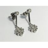 A Pair of Diamond Pendant Earrings, in 18ct white gold.